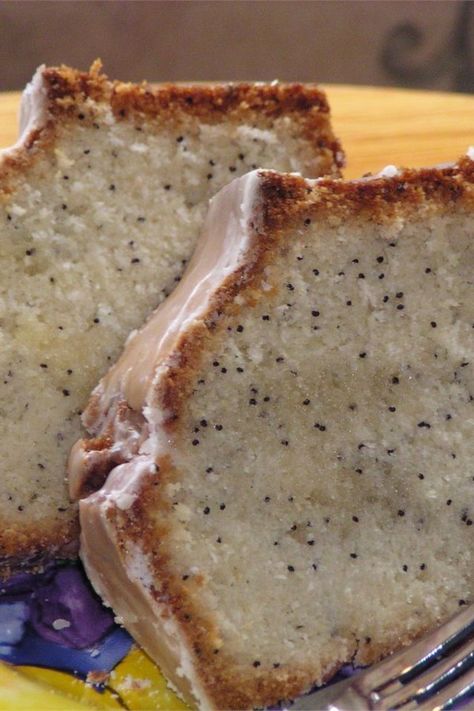 Poppy Seed Bread with Glaze | "I was trying to match a fantastic poppy seed bread that I purchase at a Mennonite bakery, the best I've ever tasted. I've tried several other similar receipes and this is the closest I've come. I'll definitely make this a "regular bake" at my house." #allrecipes #bread #breadrecipes #bakingbread #howtobakebread Poppy Seed Bread With Glaze, Almond Poppy Seed Bread, Bread With Glaze, Poppyseed Bread, Poppy Seed Bread, Silicone Baking Pans, Seed Bread, Quick Bread Recipes, Glaze Recipe