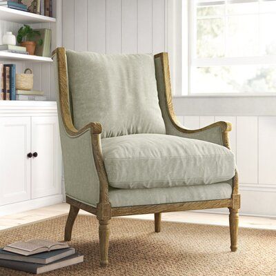 This vintage-inspired armchair brings traditional style and extra seating to your farmhouse living room or family room. Its frame is made from solid maple and oak wood, then upholstered in family-friendly polyester that's sure to stand up to the occasional spill. Design details like a loose back and carved wood accents will make it a family favourite, while its seat is filled with foam and supported by a web suspension for a medium-firm feel that'll last for years to come. Plus, its seat/back cu Farmhouse Accent Chair, Upholstered Arm Chair, Laurel Foundry Modern Farmhouse, Farmhouse Living, Hallway Decorating, Wood Accents, Birch Lane, Extra Seating, Carved Wood