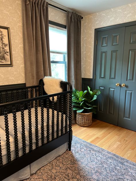 Non Traditional Nursery Ideas, Crib In Middle Of Nursery, Walnut Crib Nursery, Cozy Boy Nursery, Vintage Nursery Ideas Neutral, Gender Nursery Neutral, Vintage Gender Neutral Nursery, Black Crib Nursery, Dark Green Nursery