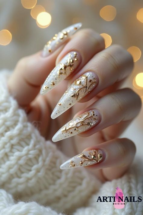 Artistic elegance nails for the holidays! Gold Holiday Nails Christmas, Christmas Nails Gold And White, White Gold Christmas Nails, Red Nails With Gold Foil, Christmas Nails With Gold, White And Gold Christmas Nails, Gold Winter Nails, Eclectic Nails, Golden Nails Designs