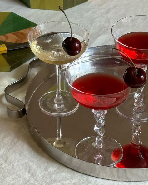 Summer cocktails with a cherry on top by @kirthanaa featuring our Frenchette Bistro Glass and Coupe Glass & Squiggle Tray by @sophieloujacobsen - all available on Glassette 🍒 #hosting #tablescape #summerhosting #cocktailhour #tableideas #beautifuldinner #summer #cocktails Cocktail Coupe Glasses, Hosting Tablescape, Crush Songs, Influencer Trip, Living Room Tray, Cherry Coded, Taller Marmo, Serving Drinks, Cherry On Top