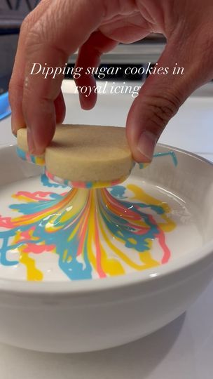 6.5K views · 1.5K reactions | Royal icing dipping method is a fun technique for marbling, tie-dye, and more. In this vid, I have a bowl white, flood consistency royal icing. I added three colors to the top of the white and dipped the cookie directly in. You can use a scribe to swirl the colors in the bowl as well. Let the excess icing drip off of the cookie. Place on a baking sheet and use a scribe to clean the edges or pop any bubbles. Happy decorating! | Rebekah Kamauu | cookiecurator · Original audio Tie Dye Icing Technique, Tie Dye Cookies Royal Icing, Tie Dye Sugar Cookies, Tie Dye Cookies, Tie Dye Frosting, Icing Drip, Marble Cookies, Number Cookies, Sugar Sheets