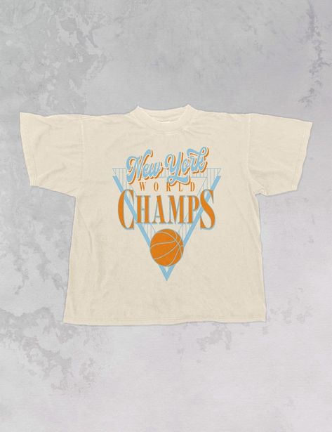 Oversized New York World Champs T-shirt in ivory. Perfect for layering or wearing on its own. #underground #newyork . #Basketball_Tshirts_Designs #Cute_Team_Shirts_Design #Vintage_Basketball_Shirt_Design #Vintage_Championship_Tee Basketball Tshirts Designs, Cute Team Shirts Design, Dance Team T Shirt Designs, Vintage Tshirt Design Ideas, Vintage Team Shirts, Athletic Tshirt Designs, Sports Graphic Tees, Sport Tshirt Designs Ideas, Elementary Shirts