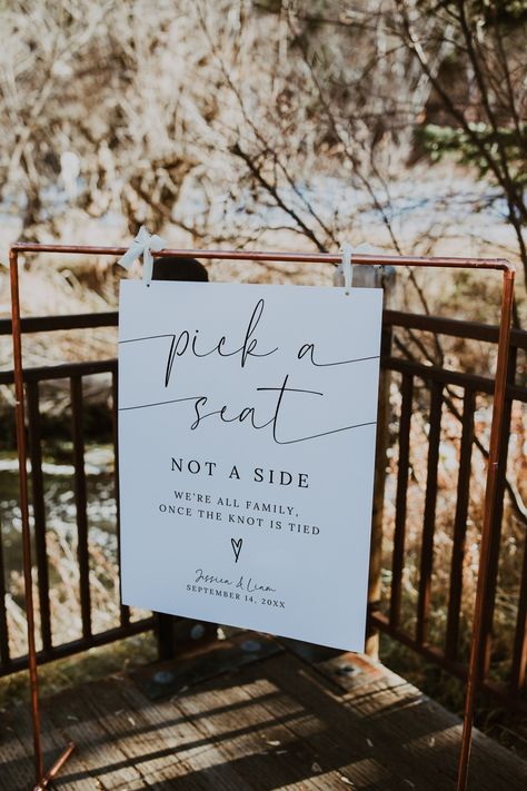 Welcome your guests with warmth and unity with our "Pick a Seat, Not a Side" Wedding Sign Template! This elegant sign invites your loved ones to sit wherever they choose, emphasizing the joining of families and the celebration of love during your wedding ceremony. Instant Digital Download: Access a high-quality, customizable template immediately upon purchase, ready to personalize and print. Elegant Design: The sign features a sophisticated and stylish layout with refined typography and decorati Choose A Seat Not A Side, Wedding Sit Anywhere Sign, Wedding No Seating Chart Sign, Spring Ceremony Decorations, Sit Wherever Sign Wedding, Pick A Seat Not A Side Sign, Pick A Seat Not A Side, Wedding Sitting Area, Wedding Signs Ceremony