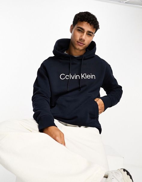 Hoodies & Sweatshirts by Calvin Klein Act casual Drawstring hood Logo print to chest Pouch pocket Regular fit Hero Logo, Calvin Klein Hoodie, Comfort Hoodie, Blue Hoodie, Jeans Shop, Logo Print, Pocket Pouch, Must Haves, Calvin Klein