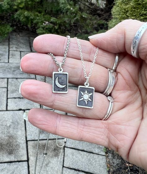 "This sun and moon matching necklace set is perfect as a gift for couples, sisters, siblings, and best friends. The charms are etched from reclaimed silver and polished to a beautiful shine.  Because I use reclaimed silver to create each piece, there may be slight variations in the texture of the silver, giving each charm an organic and rustic look. I then add a patina to darken the recessed area of the charm to ensure the sun and moon stand out, then I polish again. Each set of necklaces comes with your choice of the stainless steel rolo chain adjustable between 18\" and 20\" and/or sterling silver chain adjustable between 16\", 18\" and 20\". Please feel free to message me with questions, I typically respond very quickly. Please check the listing description for the processing speed, und Sun And Moon Jewelry Necklaces, Moon And Sun Necklace Couple, Matching Best Friend Necklaces, Matching Jewelry For Couples Necklaces, Matching Sun And Moon Necklaces, Sun And Moon Necklace Best Friends, Sun And Moon Matching Necklaces, Sun And Moon Necklace Couples, Matching Necklaces Aesthetic