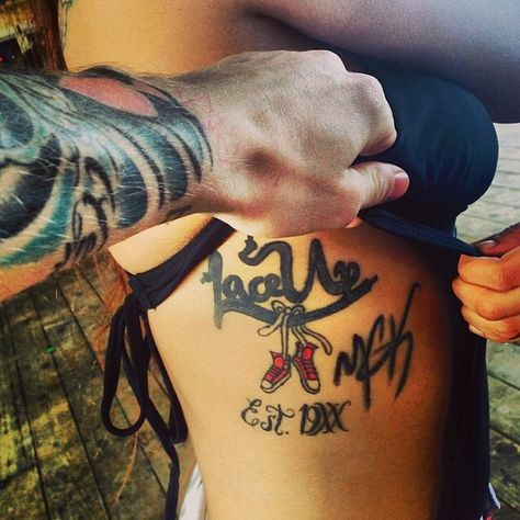 this, but smaller and in a different place. Lace Up Tattoo, Est Tattoo, Mgk Tattoos, Small Side Tattoos, Est Tattoos, Mgk Lace Up, Lower Stomach Tattoos, Small Girly Tattoos, Up Tattoo