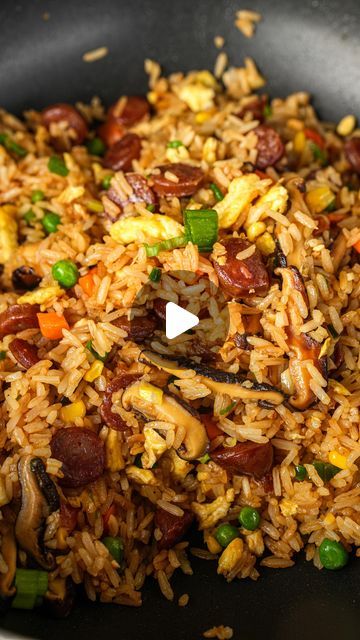 Christian Ou on Instagram: "CHINESE SAUSAGE FRIED RICE: Fried rice is hands down one of my favorite things to make, It is such a great way to use any leftovers you have. You can use whatever vegetables you have lying around and any protein you like. I love adding Chinese sausage because it is packed with sweet and savory flavors, and just makes the fried rice taste better!  INGREDIENTS: 2 cups day old rice 2 eggs 3 Chinese sausage, sliced 4 shiitake mushrooms, sliced 4 clove garlic, minced 2 scallion, separate white and green parts 1 cup frozen vegetables (peas and carrots) 2 tbsp light soy sauce 1 tsp dark soy sauce 1 tsp sesame oil 1/4 tsp white pepper  1/2 tsp chicken bouillon powder (optional)  Directions: 1. In a small bowl, whisk 2 eggs. In a pan or wok, heat 1 tbsp of oil over high Sausage Fried Rice, Chicken Bouillon Powder, Bouillon Powder, Rice Fried, Dark Soy Sauce, Chinese Sausage, Peas And Carrots, Chicken Bouillon, Shiitake Mushrooms