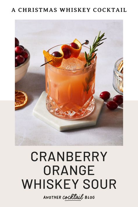 This cranberry orange whiskey sour is a vibrant cocktail that balances the rich, warmness of whiskey with tangy cranberry and bright citrus. This egg-free sour is a smooth and refreshing take on the classic whiskey sour that's perfect for the holiday season. Orange Whiskey Sour, Cranberry Cocktail Recipe, Caramel Apple Martini, Whiskey Sour Recipe, Whisky Sour, Peppermint White, Orange Cocktails, Cranberry Cocktail, Classic Cocktail Recipes