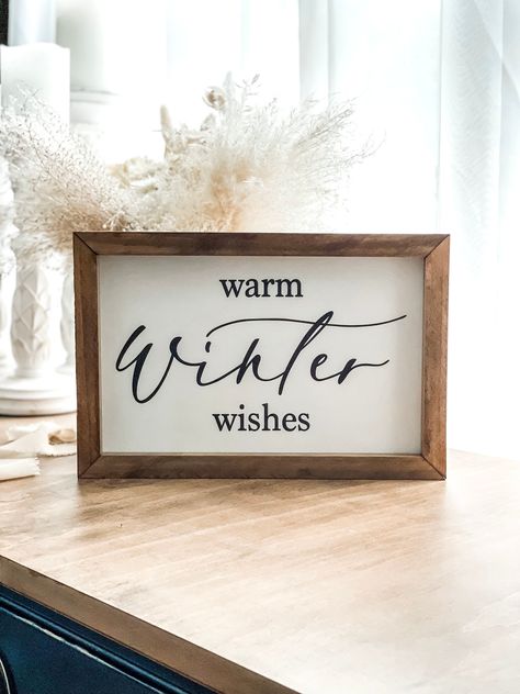 "Lovely rustic winter sign you can hang on your wall or place on a countertop or shelf. Put it up with your holiday decor and leave it up through the winter!  This is a handmade wood sign with \"warm winter wishes\" design. This sign comes standard with a white background and black font. For a simple color reversal to a black background with white font just leave a note at checkout with your instructions. Measurements: 8\"x12\"" Cozy Winter Party Decorations, Winter Decor Ideas For The Home Rustic, Nordic Winter Decor, Simple Winter Decor Ideas For The Home, Winter Sayings For Signs, Winter Signs And Sayings, Winter Signs Wooden, Winter Diy Decor, Winter Wood Signs