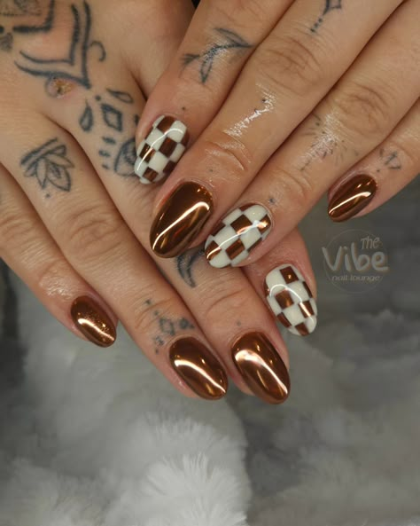 Copper cutie ✨🤎 Thanksgiving is -2 weeks away 🦃 . #copper #coppernails #chromenails #chrome #checkerednails #fallnails #autumnnails #novembernails #Thanksgivingnails #mochanails #moscowmulenails #almondnails #hardgel #brown #brownnails #brownchrome #rizz #Pinterest #nailinspiration #TheVibeNailLounge #NewYorkNails #607nails Design With Chrome Nails, Silver Checkered Nails, Professional Cute Nails, Winter And Fall Nails, Brown Gold Chrome Nails, Spring Brown Nails, Chrome Zebra Nails, Checkered Chrome Nails, Chocolate Brown Nails With Chrome