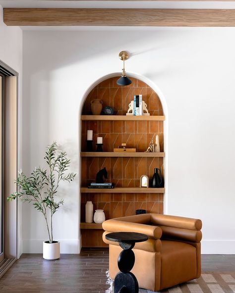 Cozy reading nook 🧡 featuring the Evie Swivel Chair. Design c/o: @kristinelizabethstudio⁠ #paynesgray Terracotta Tile Living Room, Tile Arch, Organic Living Room, Transitional Furniture, Barber Shop Decor, Living Room Tiles, Custom Shelving, Modern Shelf, Home Decor Brands