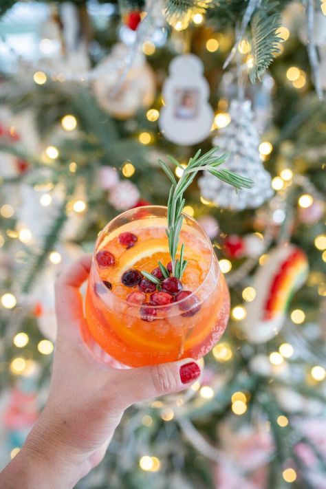 I love Aperol Spritz cocktails and I am sharing our favorite winter Aperol Spritz that you'll love! It's perfect for your holiday parties, celebrations and even new years! Check out this post for all the details. Winter Aperol Spritz, Spritz Cocktails, Aperol Spritz Recipe, Spritzer Recipes, Spritz Recipe, Festive Cocktails, Winter Cocktails, Festive Drinks, Christmas Cocktails