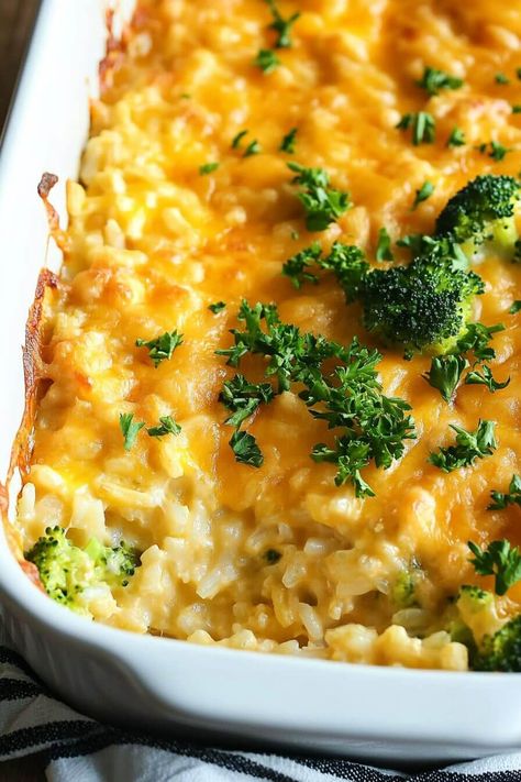 aspic7_httpss.mj.rungGCni-YXliU_The_image_is_a_close-up_of_a__a0a70cf7-bda9-4a43-91d2-8b390c596757_3 Chicken Broccoli Rice Cheese Casserole With Mayo, Chicken Rice Broccoli Casserole, Broccoli Cheese And Rice Casserole, Chicken Broccoli Rice Cheese Casserole, Chicken Broccoli Cheese Casserole, Cheesy Chicken Broccoli Rice Casserole, Broccoli Cheese Rice Casserole, Easy Broccoli Recipes, Broccoli Cheese Rice