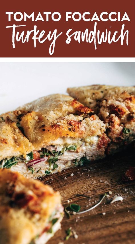 Trader Joe's Sun-Dried Tomato Focaccia Turkey Sandwich! Pillowy sun-dried tomato focaccia gets piled with pesto mayo, turkey, juicy tomato slices, and greens. This sandwich is a beauty and practically a lifestyle! #turkeysandwich #focaccia #traderjoes Trader Joes Sandwich Ideas, Focaccia Sandwich Ideas, Foccacia Sandwich, Pesto Turkey, Tomato Focaccia, Pesto Mayo, Turkey Sandwiches Recipes, Perfect Turkey, Turkey Sandwich