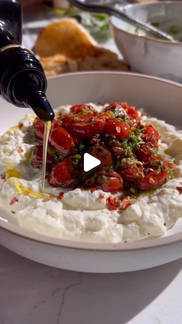 Nadia Aidi on Instagram: "Burrata Filling AKA Stracciatella…COMMENT ‘BURRATA FILLING’ and I’ll DM you recipe, or you can scroll down for it! The Roasted Tomatoes & Arugula take this over the edge. Clearly this is not the traditional way of making stracciatella but a quick hack that works, and keeps you from buying it at TJ’s 👀

Stracciatella is the filling of #burrata and it is basically pulled mozzarella curds soaked in cream, so this lil shortcut works if you don’t want to make mozzarella from scratch or can’t find mozz curds like me ❤️. 

Ingredients:
•8 oz fresh mozzarella.
•3/4 cup heavy cream (add 1/4 c more if you want it looser).
•1 pint sugar bomb tomatoes.
•8 basil leaves.
•1/4 cup chives.
•1/4 c pistachio.
•large handful arugula.
•1.5 tbsp white balsamic.
•1/4 cup olive oil (mo How To Use Burrata Cheese, What To Make With Burrata Cheese, Straciatella Recipe Cheese, Burrata Cheese Recipes, Burrata Recipe Appetizers, Burrata Cheese Recipe, Hands Pretty, Arrabiata Sauce, Burrata Recipe