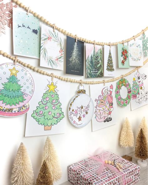 14 of the Best Christmas Decorations for 2022 and Beyond Christmas Cards Display, Christmas Card Display Ideas, Displaying Christmas Cards, Christmas Photo Display, Picture Garland, Hanging Christmas Cards, Kids Artwork Display, Holiday Card Display, Picture Collages