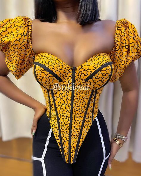 Ankara Cosette Tops, Corset Adire Styles, How To Make Cosette Top, Cosette Dress Styles Lace, African Corset Tops, Corset Tops Outfit, African Print Corset Top, Cute Corset Tops, Corset Top Outfits