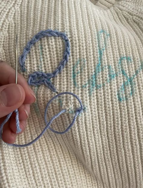 How To DIY a Hand Embroidered Name Sweater • Emily Rone Home Chunky Name Sweater Diy, Diy Hand Embroidered Sweater, How To Embroider A Name, How To Embroider A Beanie By Hand, Yarn Writing On Sweater, Letter Stitching Hand Embroidery, Name Stitching Hand Embroidery, Embroider Names Diy Hand Embroidery, Hand Embroidered Name