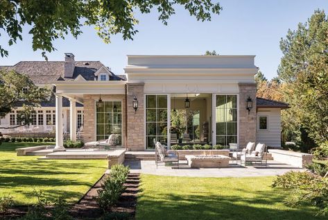 he classically designed pool house replicates the European flair of the main home. Photo by Joshua Caldwell Architecture by Clayton Vance Build by Jackson & Leroy Landscape by Northland Design Group Design by Doran Taylor Inc. Jackson Leroy, Indoor Pool House, Lantern Light Fixture, Utah Style, Stone Pool, Stairs In Living Room, Garden Pavilion, Summer Series, European Architecture