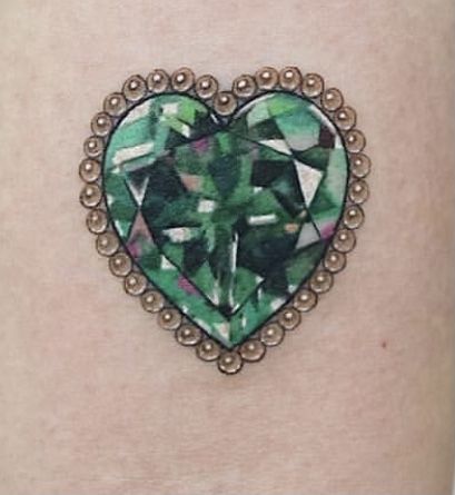 Green Jewel Tattoo, Gem Stone Tattoo Design, Green Gem Tattoo, Peridot Tattoo, Grandma Tattoos, Jewelry Tattoos, Stone Tattoo, Gem Tattoo, Jewel Tattoo