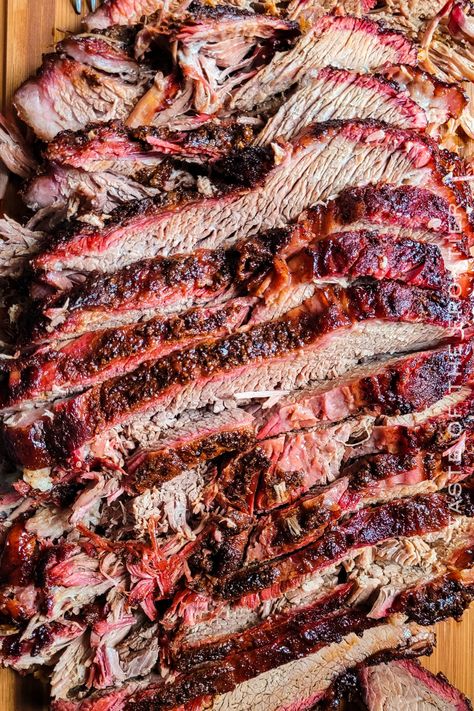 Smoked Beef Brisket is a classic barbecue dish that is perfect for summer cookouts. Traeger pellet grills make it easy to get the perfect smoke flavor, and the results are juicy and delicious. Here's how to make smoked beef brisket on your Traeger grill. Smoked Brisket Flat Recipe, Smoked Beef Ribs, Brisket Flat, Brisket Recipes Smoked, Smoked Mac And Cheese, Pork Belly Burnt Ends, Best Egg Salad Recipe, Brisket Recipe, Smoker Grill