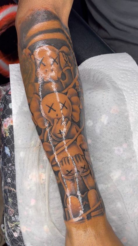 Hear No Evil See No Evil Tattoo Kaws, Kaws See No Evil Hear No Evil, Men Back Tattoos Ideas, See Speak Hear No Evil Tattoo, Hardest Tattoos Men, Kaws Arm Tattoo, Here No Evil Speak No Evil Tattoo, Kaws Sleeve Tattoo, Arm Tats Men Sleeve