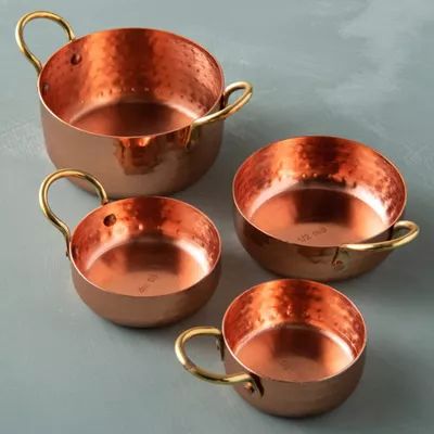 The Best Copper Pans, Pots, and Kitchen Tools to Own Right Now Gold Measuring Cups, Copper Measuring Cups, Non Toxic Cookware, Royal Kitchen, Copper Utensils, How To Polish Copper, Ceramic Cookware, Copper Handles, Copper Kettle