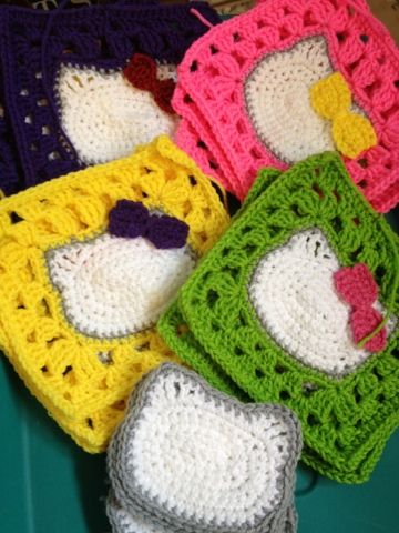 Hello Kitty squares in progress... Hello Kitty Crochet Square, Kawaii Granny Square Crochet, Hello Kitty Granny Square Pattern, Crochet Hello Kitty Pattern, Hello Kitty Granny Square, Kitty Granny Square, Crochet Cat Granny Square, Hello Kitty Crochet Pattern, Cat Granny Square