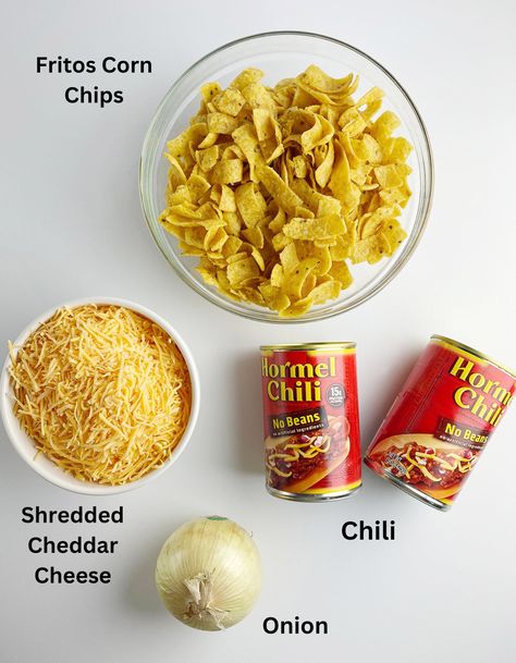 Sometimes you just need a little Frito Chili Pie and that's all there is to it. Here's your easy recipe! And I do mean EASY. #fritos #chili #supper #fritochilipie #framedcooks #kidfriendly Pepper Bellies Fritos, Frito Meals, Walking Chili Fritos, Fritos And Chili, Frito Pie With Canned Chili, Easy Frito Chili Pie, Chili Frito Pie Recipe Easy, Frito Boats Recipes, Frito Chili Pie Recipe Easy