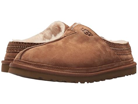 UGG Neuman (Chestnut) Men's Clog Shoes The Neuman has a slim fit that will stretch out over time. If you are in between sizes please size up based on the volume of your foot and height of your instep. Enjoy yet another great addition to the slipper family with the Neuman from UGGÂ. Silkee suede upper with heat embossed UGG logo in an easy slip on and off silhouette. Genuine sheepskin lining naturally wicks away moisture and keeps the foot warm. Genero #UGG #Shoes #ClosedFootwear #Clog #Brown Radiation Care Package, Types Of Footwear, Mens Ugg Slippers, Birkenstock Boston Shearling, Boston Shearling, Ugg Boots Australia, Mens Clogs, Clog Shoes, Shearling Boots