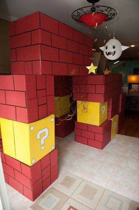 Bring Super Mario Brothers to life with these amazing brick & question mark box decorations Mario Brothers Party, Super Mario Bros Party Ideas, Cardboard Forts, Super Mario Brothers Party, Mario Kart Party, Mario Bros Birthday Party Ideas, Nintendo Party, 4de Verjaardag, Super Mario Bros Birthday Party