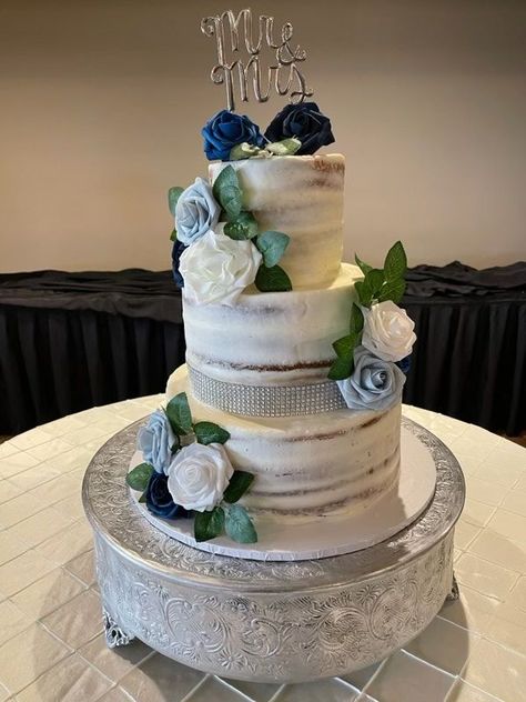 The couple chose beautiful blues to accent this half naked wedding cake made by our in-house baker! #wedding #weddingcake #halfnakedcake #inhousebaker #blue #flowers #rustic #theempressestate #woodlandchateau #woodlandwa Blue Wedding Cake, Wedding Cakes Blue, Blue Wedding, How To Make Cake, Blue Flowers, Diaper Cake, Wedding Cake, Real Weddings