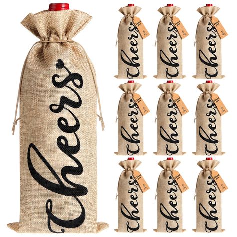 PRICES MAY VARY. Package contents: you will get 12 packs of burlap wine bags with 12 pieces of printed tags, and a 32.81 feet long drawstring; Sufficient quantity and thoughtful combinations will serve your everyday and holiday use very well Size and material: these wine wrapping bags are made of reliable linen cloth, sturdy and reusable, and can keep the bottles away from dust; The size of each wine bag for gift is approx. 13.78 x 5.91 inches, suitable for holding standard size bottles, like be Christmas Wine Bags Cricut, Wine Wrapping, Christmas Wine Bags, Christmas Burlap, Wine Bags, Market Ideas, Linen Cloth, Linen Color, Wine Bottle Crafts