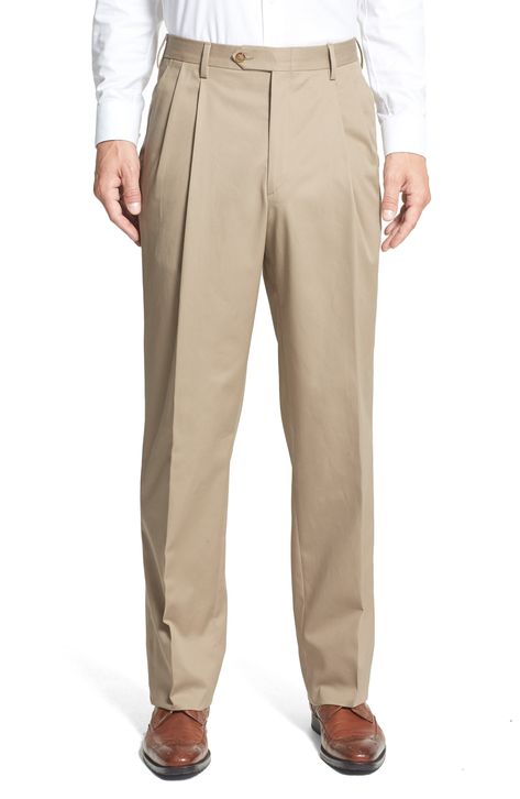 A classic pleated cut styles sharp cuffed trousers fashioned from soft, wrinkle-resistant cotton. 19" leg opening; 12" front rise; 18" back rise (size 34x30). Zip fly with hook-and-bar closure. Front slant pockets; back button-closure welt pockets. 100% cotton. Machine wash cold, tumble dry low. By Berle; imported. Men's Clothing. Tailored Pants For Men, Cuffed Trousers, Uniform Pants, Men Suit, Men Trousers, Mens Dress Pants, Trouser Style, Pants Design, Tailored Pants