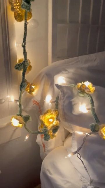 Garland Crochet, Crochet Fairy Lights, Crochet Lights, Crochet Flower Lights, Crochet Flower Garland, Crochet Flower Lights Pattern, Hanging Flower Crochet Pattern, Crochet Light Garland, Fairy Light Crochet Flowers