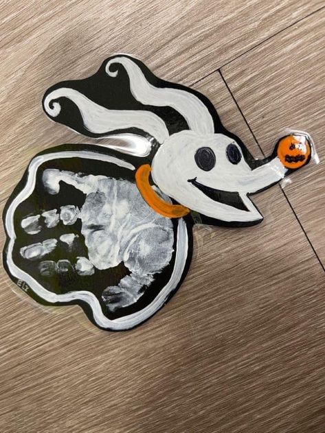 Infant Caterpillar Crafts, Spooky Handprint Art, Halloween Art Projects For Infants, Nightmare Before Christmas Footprint Art, Nightmare Before Christmas Handprint Art, Disney Halloween Activities, Toddler Halloween Art Projects, Handprint Halloween Crafts For Toddlers, Halloween Toddler Painting