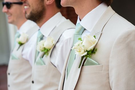 Cream and mint green Walt Disney World groomsmen attire Cream Suit With Sage Green Tie, Cream Suit Green Tie, Pink And Green Groomsmen Attire, Sage Tie Wedding, Tan Suit Green Tie, Sage Green Bridesmaid Dresses With Groomsmen, Green Groomsmen, Mint Green Bridesmaids, Wedding Groomsmen Attire