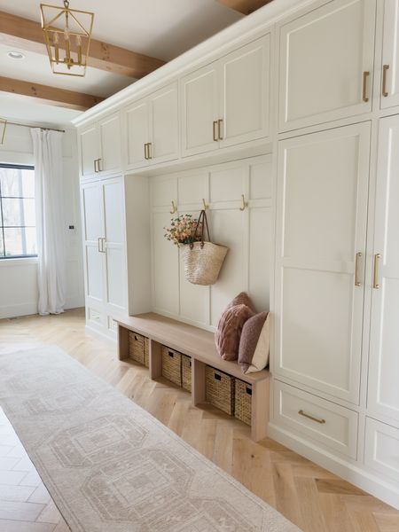 Mudroom Bench Cabinets, White And Wood Mudroom, White And Gold Mudroom, Laundry Room White Oak Cabinets, Panelled Mudroom, Mudroom Wall With Bench, Mudroom Locker Storage, Mudroom Family Room Combo, Marble Mudroom