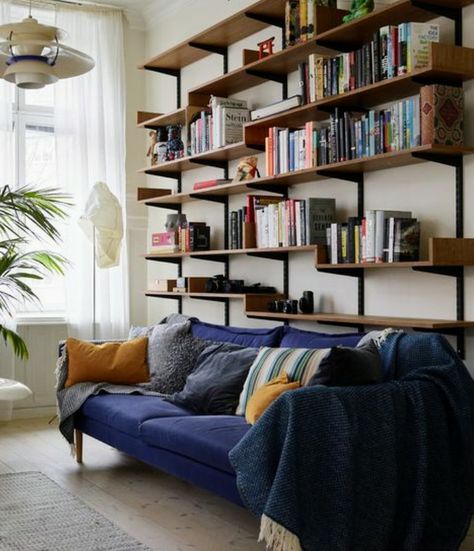 Book Shelves Above Sofa, Tee Bookshelves, Bookshelf Over Couch, Bookshelves Above Sofa, Book Shelves Above Couch, Shelving Above Sofa, Bookshelf Behind Sofa, Shelves Display Ideas, Bookshelves In Bedroom Aesthetic