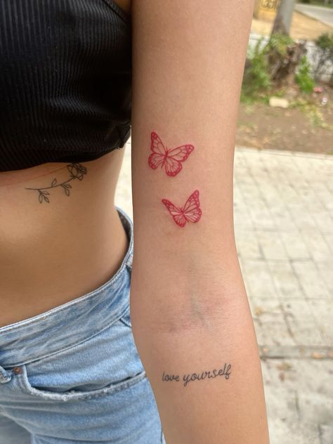 Wrist Tiny Tattoo, Subtle Arm Tattoo, Vanessa Butterfly Tattoo, Butterfly Stamp Tattoo, Red Ink Tattoos Butterfly, Red Butterfly Tattoo Arm, Happiness Is A Butterfly Tattoo, Minimalist Tattoo Butterfly, Dainty Butterfly Tattoos