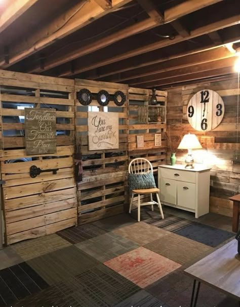 Basement Pallet Divider Wall Sheet Walls Basement, Pallet Wall Basement, Pallet Basement Walls, Basement Pallet Wall Ideas, Unfinished Room Ideas, Unfinished Bedroom Ideas, Wood Pallet Room Divider, Pallets Room Divider, Cheap Basement Wall Ideas Concrete