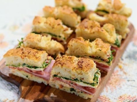 Mini Focaccia Italian Sandwiches & Lambrusco Mini Muffaletta Sandwich, Cold Italian Sandwiches, Mini Italian Sandwiches, Focaccia Bread Sandwiches, Christmas Finger Sandwiches, Foccacia Sandwich Ideas, Mini Focaccia Bread, Mini Sub Sandwiches, Foccacia Bread Sandwiches