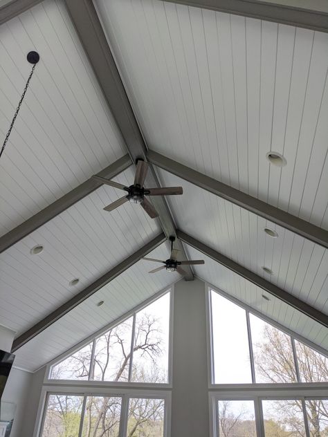 Vaulted ceilings. White shiplap ceilings. Grey wood beams White Ceiling Black Beams, Grey Ceiling Beams, Shiplap Ceiling Vaulted, Shiplap Ceiling With Beams, Farmhouse Ceiling Ideas, White Shiplap Ceiling, Log Playground, Sunroom Ceiling, Shiplap Ceilings