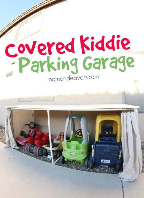 Build a covered kiddie parking garage to keep those kid cars organized & protected from the weather! DIY directions via momendeavors.com Backyard Clubhouse, Mackenzie Marie, Kids Car Garage, Outdoor Toy Storage, Childcare Business, Diy Toy Storage, Kids Outdoor Play, Playhouse Outdoor, Organizing Hacks