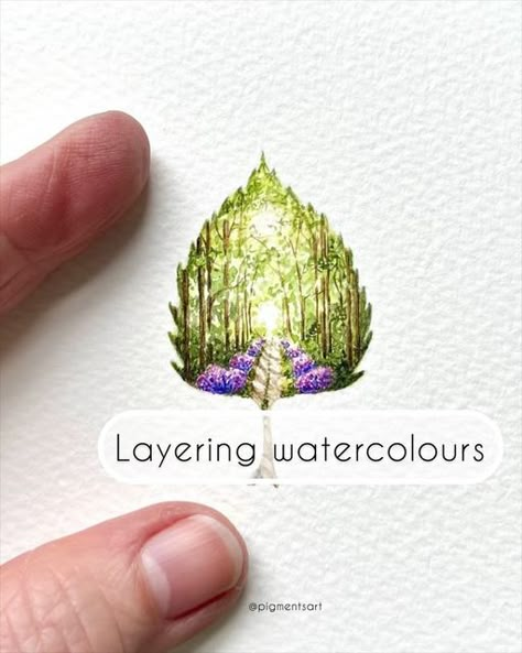 Pigments Art on Instagram: "Layering is a big part of my watercolour process and this miniature painting is a good example of my technique. I hope you enjoy watching 💚💜 . ‘Woodland walk’ original watercolour painting is available on my website - link in bio . Brushes: @princetonbrush Paint: @winsorandnewton Paper: @st.cuthberts.mill Bockingford 300gsm . . . #tiny #tinyart #miniwatercolor #micropainting #microartist #microart #pigmentsart #forestpainting #forestart #treepainting #watercolorlandscape #landscapewatercolor #woodlands #princetonbrushes #forestwalk #watercolorartist #landscapepainting #watercolorpainting #artistsatwork #artistatwork #artistonig #watercolorreels #natureinspiredart #natureillustration #instawatercolor #watercolorart #watercolorgallery #wildflowerpainting #proces Watercolor Layering, Tiny Watercolor Paintings, Miniature Watercolor Paintings, Mini Watercolor, Austin Kleon, Woodland Walk, Watercolor Art Diy, Wildflower Paintings, Watercolor Video