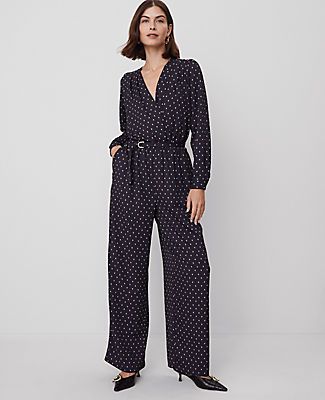 This dotted jumpsuit is beautifully shaped with a wrap-effect front, nipped waist and flowing wide leg silhouette. V-neck. Long blouson sleeves with puff shoulders and button cuffs. Elasticized waist with removable D-ring belt. Front slash pockets. Lined.,Hit:Hits at ankle, Imported:Imported, Length:30 1/2” inseam, Fabrication:100% Polyester, Garment Care:Machine Washable Dotted Wrap Jumpsuit by Ann Taylor Size Classic - 8 Black Women's Rompers, Jumpsuits, Regular, V-Neck, Long, Sleeve, Dresses, 100%, Polyester, Machine, Washable Wrap Jumpsuit, Ring Belt, Long Sleeve Dresses, Sleeve Dresses, Petite Dresses, Rompers Women, Ann Taylor, Size 16, Wide Leg