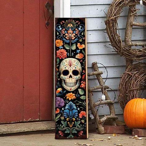 PRICES MAY VARY. Perfect Halloween Decor: Our halloween porch sign features a black background with floral prints, a skull in the center, and rust-like edges (not real rust), adding a spooky vibe to your halloween porch. Quality Material: Made of high-quality wood, this wooden vertical sign is reliable and sturdy, suitable for indoor and outdoor use. If displayed outdoors, please protect this hanging sign from adverse weather conditions. Perfect Size for Display: Once assembled, the dimensions o Fall Wooden Signs Front Porches, Halloween Signs Wooden, Door Leaners, Front Porch Halloween, Wooden Halloween Signs, Signs For The Home, Front Door Decorations, Halloween Pumpkin Crafts, Halloween Porch Sign