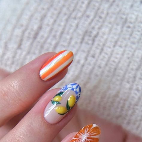 Amber Hancock on Instagram: "Amalfi coast nails🍋🇮🇹⛱️ I saw @palomanailstudio custom press on’s, and I just had to create my own version! Also managed to intertwine a @learnahstarbuck_nailartist inspired 3D Orange which I’ve been desperate to try🍊  Products used @the_gelbottle_inc  Double Denim, Signature, Michelle, Daisy, Precious, Love letter, Tiger, Ignite, Atelier, Flashing lights, Queen bee, Jungle, Crush, Doe & Clear 3D studio gel   #amalfinails #amalficoastnails #3dnails #fruitnails #detailednails #summernails #nailinspo" Amalfi Nails, Amalfi Coast Nails, Coast Nails, Abstract Nails, Flashing Lights, 3d Studio, Double Denim, Queen Bee, Nail Color