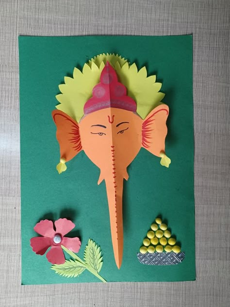 3D Ganesha with paper Ganesha Chart For School, Ganesha Board Decoration, Ganesh Chaturthi Notice Board Decoration, Ganpati Craft Ideas, Ganesh Chathurthi Decor At Home Simple, Paper Ganesha Craft, Ganpati Art And Craft For Kids, Ganesh Chaturthi Bulletin Board, Ganesha Crafts Ideas